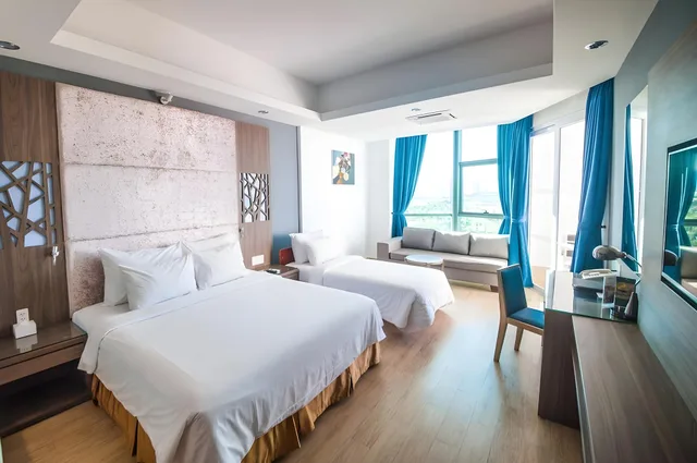 غرفة ديلوكس ثلاثية بسرير فردي بغرفة نوم واحدة، Swandor Resort Cam Ranh 2/2