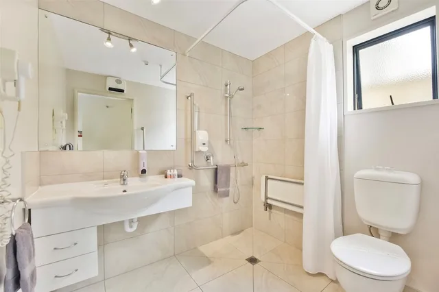 جناح تنفيذي بسرير كينج مع دخول الصالة، Gladstone Motel Nelson 3/5