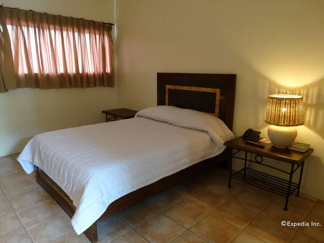 غرفة ديلوكس بسرير كوين، Citystate Asturias Hotel Palawan 3/10