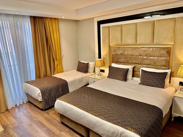 غرفة سوبيريور ثلاثية بسرير كينج وسرير فردي بشرفة، Pell Palace Hotel and Spa 1/10