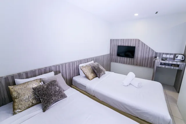 غرفة ديلوكس بسرير كوين، Capital O 90545 Ho Hotel 3/5