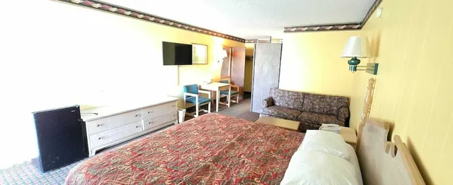 غرفة بسرير كوين للمدخنين، Sunset Inn Manning I 95 2/6