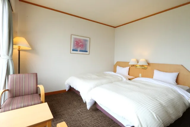 غرفة بسريرين منفصلين، Tsushima Grand Hotel 1/2