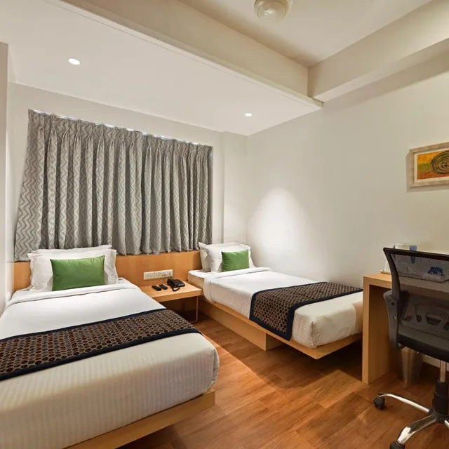 غرفة ديلوكس بسرير مزدوج أو سريرين منفصلين، Hotel Leafio Marigold Marol 2/4