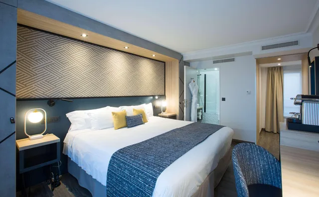 غرفة ديلوكس بسرير مزدوج مع سرير إضافي، Best Western Plus Opera Batignolles 1/5