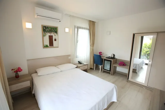 غرفة بسريرين منفصلين بإطلالة على الحديقة والمسبح، Aria Doria Otel 2/10