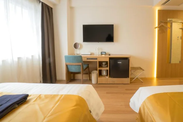 غرفة ديلوكس بسريرين مزدوجين في طابق مرتفع، KANKU JOYTEL HOTEL 3/6