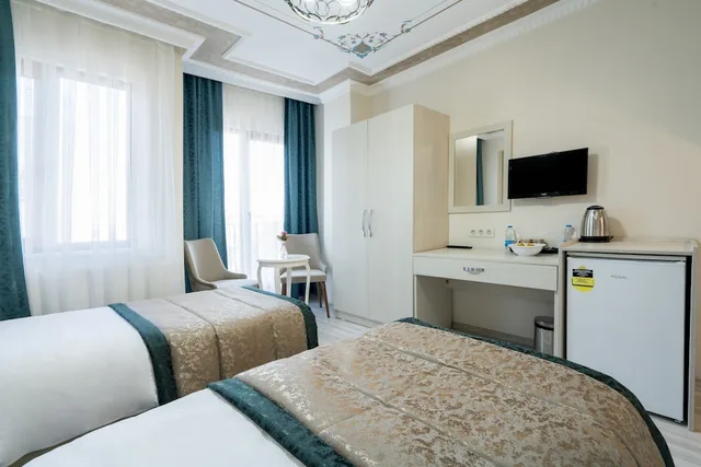 غرفة عائلية ثلاثية بسرير كوين وسرير فردي، Atam Suites Apart 7/10