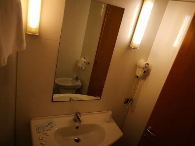 غرفة كومفورت ثلاثية بسرير فردي بإطلالة على الحديقة، Hotel Ristorante Trendy 3/6