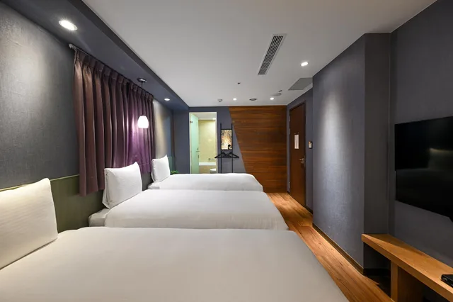غرفة ديلوكس ثلاثية بثلاثة أسرّة، Le room Hotel Kaifeng Taipei 4/4