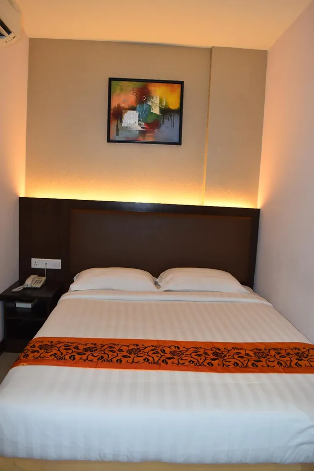 غرفة ديلوكس بسرير كوين، Sunrise Hotel 1/4