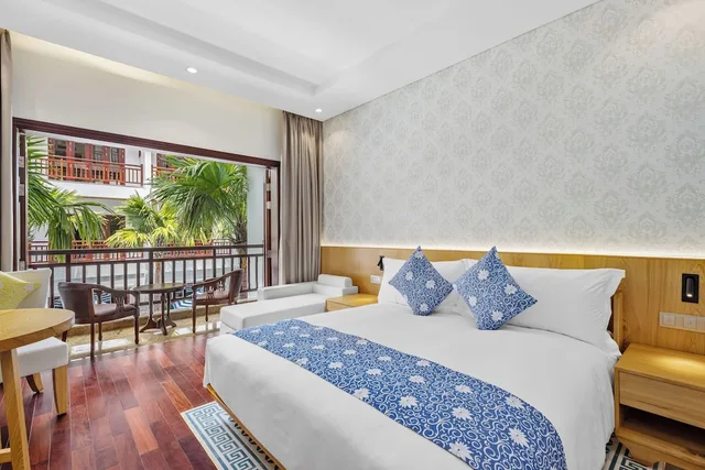 Faifo King with Pool View، Wafaifo Resort Hoi An 3/6