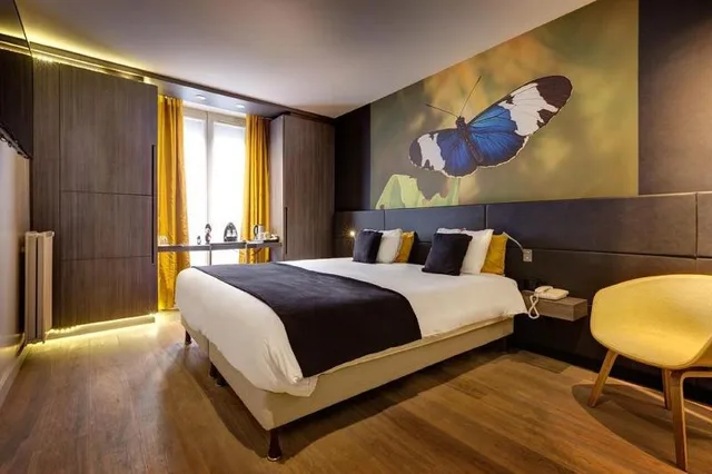 غرفة ديلوكس بسرير كوين وسريرين منفصلين، Hotel Elixir Paris 1/2