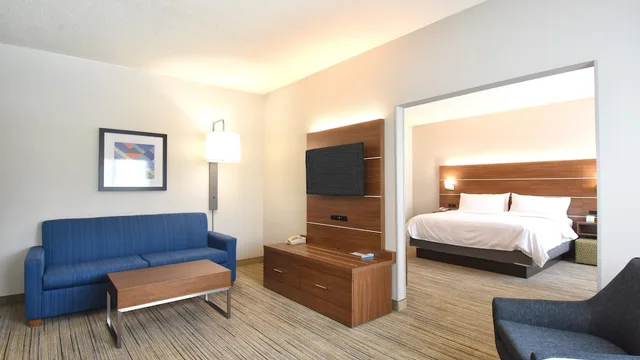 Suite, King Bed, Living Area, Holiday Inn Express Hotel And Suites Southern Pines Pinehurst Area 3/5