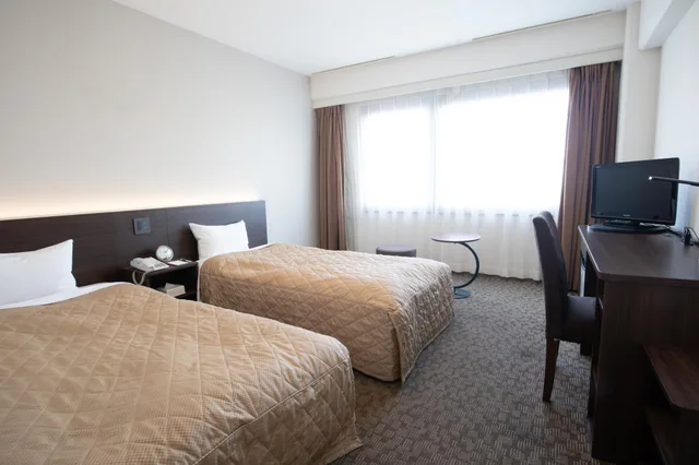 غرفة بسريرين منفصلين للمدخنين، HOTEL SUNROUTE MATSUYAMA 1/1