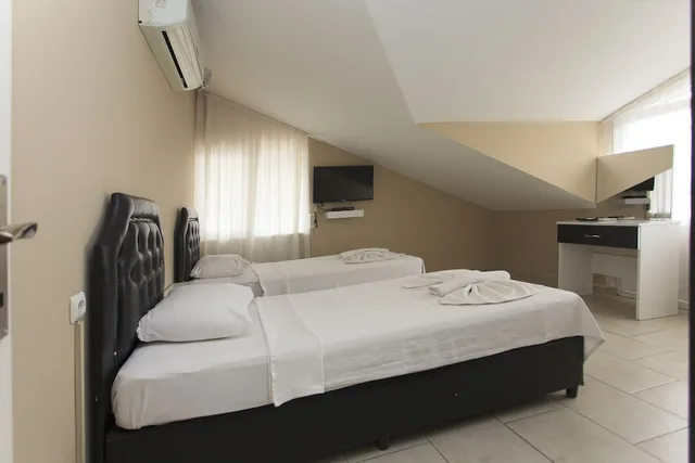 لوفت عائلي بسرير كوين وسريرين فرديين، Greenpeace Hotel 1/7