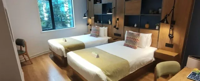غرفة ديلوكس بسريرين منفصلين، Campanile Shanghai Jing An 1/1