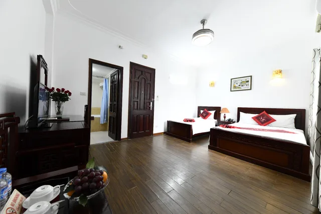 غرفة ثلاثية بسرير كينج وسرير فردي، Phoenix Legend Hotel 2/3