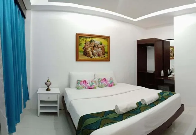 غرفة ديلوكس بسرير كينج، DISCOVER BORACAY HOTEL AND SPA 3/8