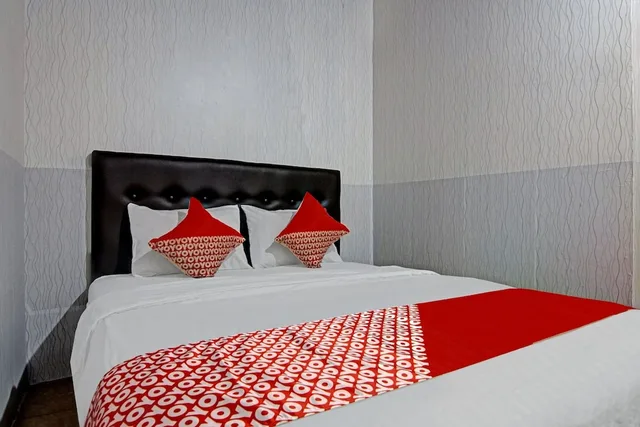 غرفة قياسية بسرير مزدوج، OYO 90358 Poris Residence 2/5