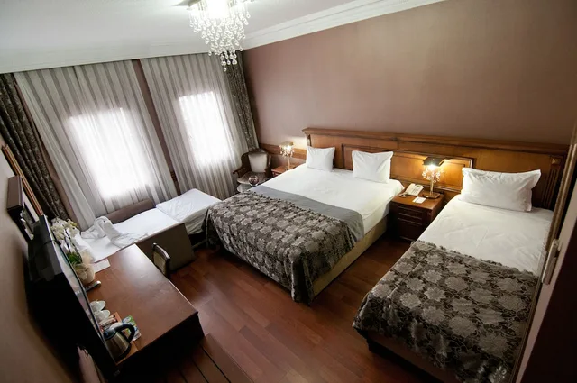 غرفة عائلية بسرير كينج وسرير فردي بإطلالة على البحر مع أريكة، FERMAN HOTEL 1/5