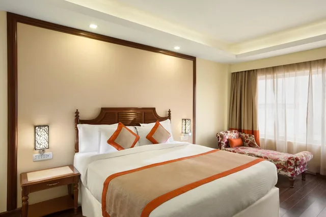 غرفة بسرير كينج، Ramada by Wyndham Jamshedpur 1/10