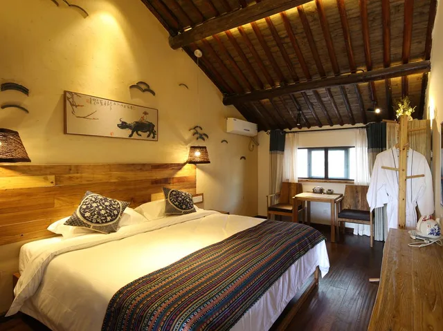 غرفة ديلوكس بسرير كينج، Tongxiang Wuzhen Yuexiang Inn 1/2