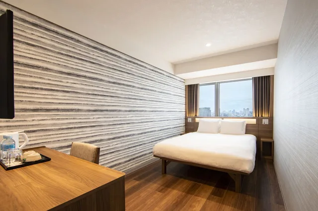 غرفة سوبيريور بسرير كوين في طابق مرتفع، Karaksa Hotel Grande Shin-Osaka Tower 1/4