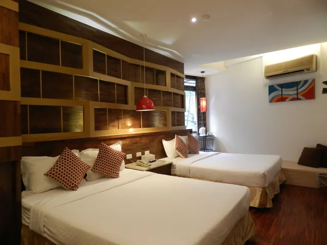 غرفة ديلوكس رباعية بسريرين مزدوجين، Mingao Spring Hotel 2/2