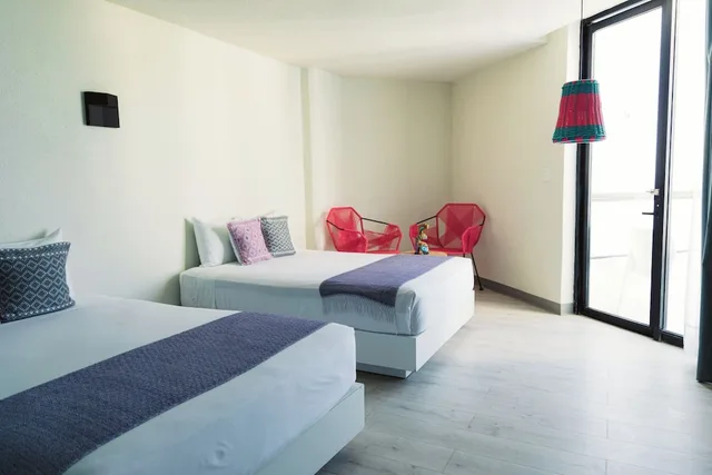 جناح جونيور بسريرين مزدوجين بإطلالة جزئية على البحر، Fontan Ixtapa 1/4