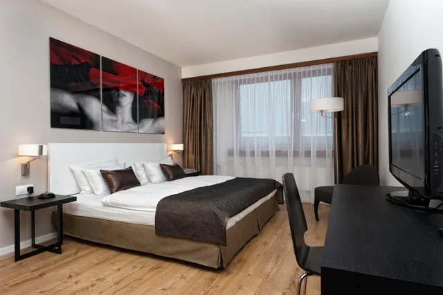 غرفة ثلاثية بسرير كينج وسرير فردي، Wyndham Stuttgart Airport Messe 2/3
