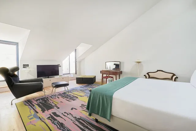 جناح بفراش فوتون وسرير كوين وسرير فردي بشرفة، Cais Urban Lodge 1/6