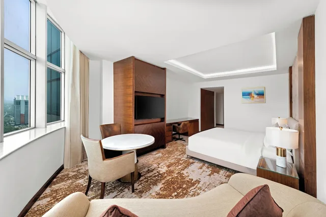 غرفة ديلوكس بسرير كينج، Movenpick Hotel Centaurus 5/9