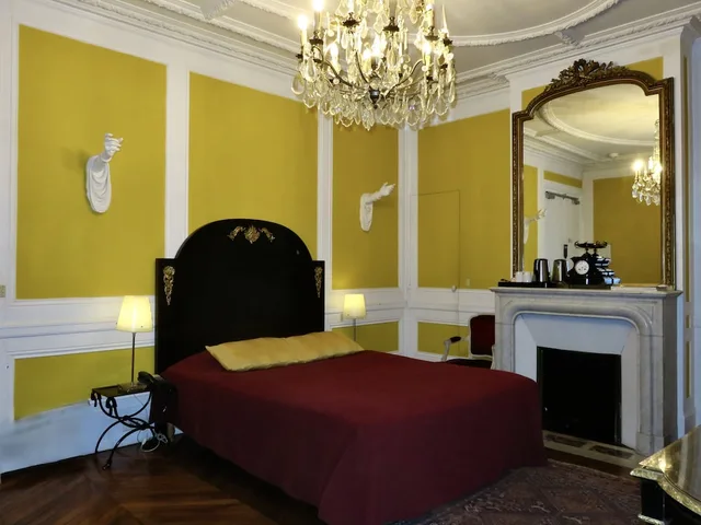 غرفة ديلوكس رباعية بسرير كينج وسرير فردي مع أريكة، Hotel Windsor Home Paris 3/8