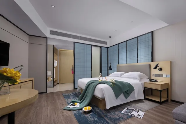 غرفة فاخرة بسرير كينج بإطلالة على المدينة، Echarm Hotel (Guangzhou Beijing Road Pedestrian Street Tianzi Wharf) 1/4
