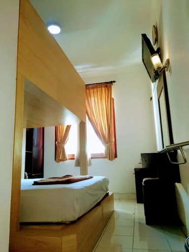 غرفة رباعية، Maliboro Inn Hotel 2/2
