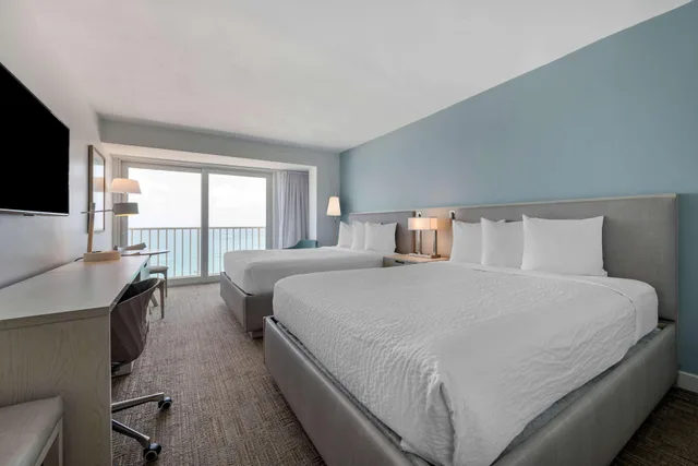 oceanview- 2 queen beds blue tower، Condado Palm Inn San Juan, Tapestry Collection by Hilton 1/3