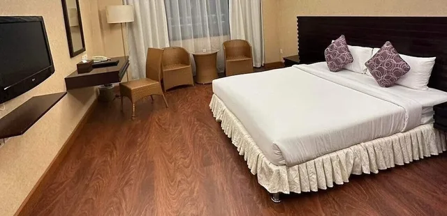غرفة قياسية بسرير كينج وسريرين منفصلين، Savan Resorts 7/11