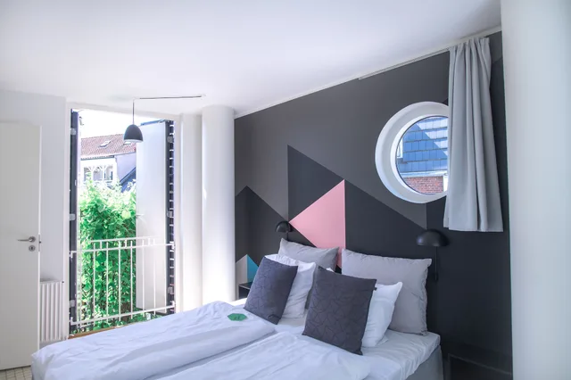 شقة بأربعة أسرّة وسرير مزدوج وسرير بطابقين بإطلالة على الفناء بغرفتي نوم، Kolding Hotel Apartments 1/8