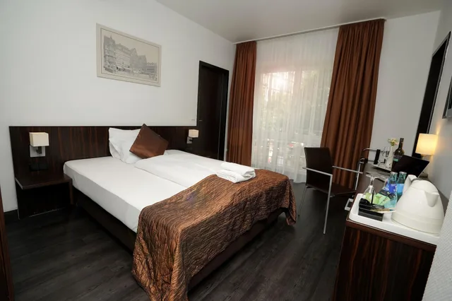غرفة ديلوكس مفردة، The Atrium Hotel 3/4
