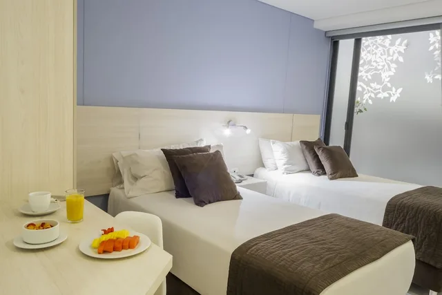 غرفة قياسية بسريرين منفصلين، Hotel Regency Boutique La Feria 4/7