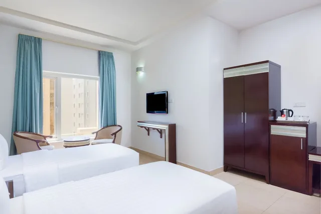 غرفة قياسية بسريرين منفصلين، Muscat Dunes Hotel 1/4