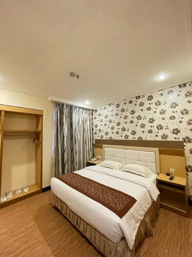 غرفة ديلوكس بسرير مزدوج، Grand Puncak Lestari Hotel 1/4
