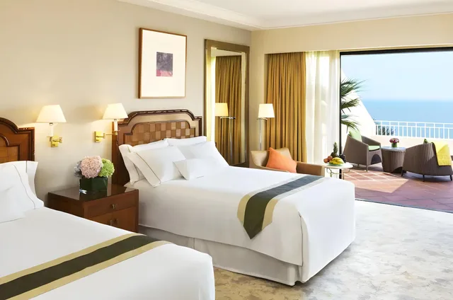 غرفة غراند ديلوكس بسريرين منفصلين بإطلالة على الشاطئ، Grand Coloane Resort 1/1