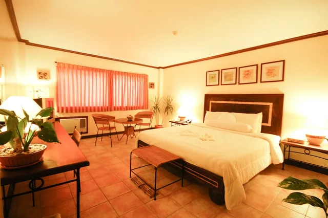 غرفة ديلوكس تنفيذية بسرير كينج، Citystate Asturias Hotel Palawan 8/10