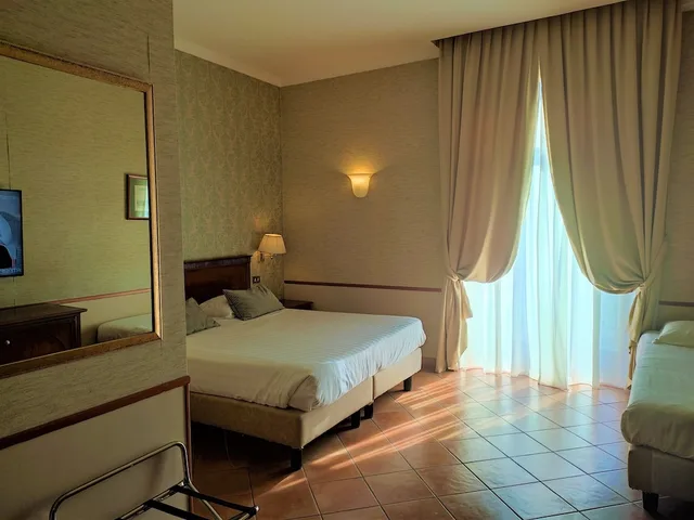 غرفة ثلاثية بسرير كينج وسرير فردي، Hotel Nuvo 3/9