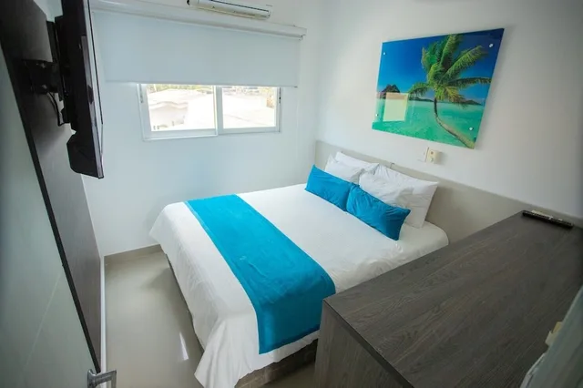 استوديو عائلي بسريرين منفصلين وسريرين كوين، Hotel Poblado Covenas 1/2