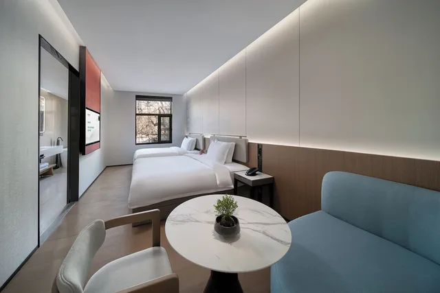 غرفة عائلية رباعية بسرير كوين بحوض استحمام، SSAW Garden Hotel Beijing 2/3