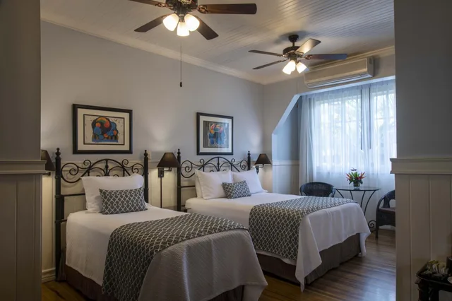 Family Suite, 1 Single and 2 Queen Beds، Hotel Grano de Oro 6/10