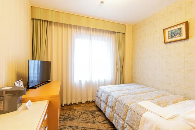 غرفة اقتصادية مفردة بسرير مزدوج، Hotel Okura Niigata 1/1